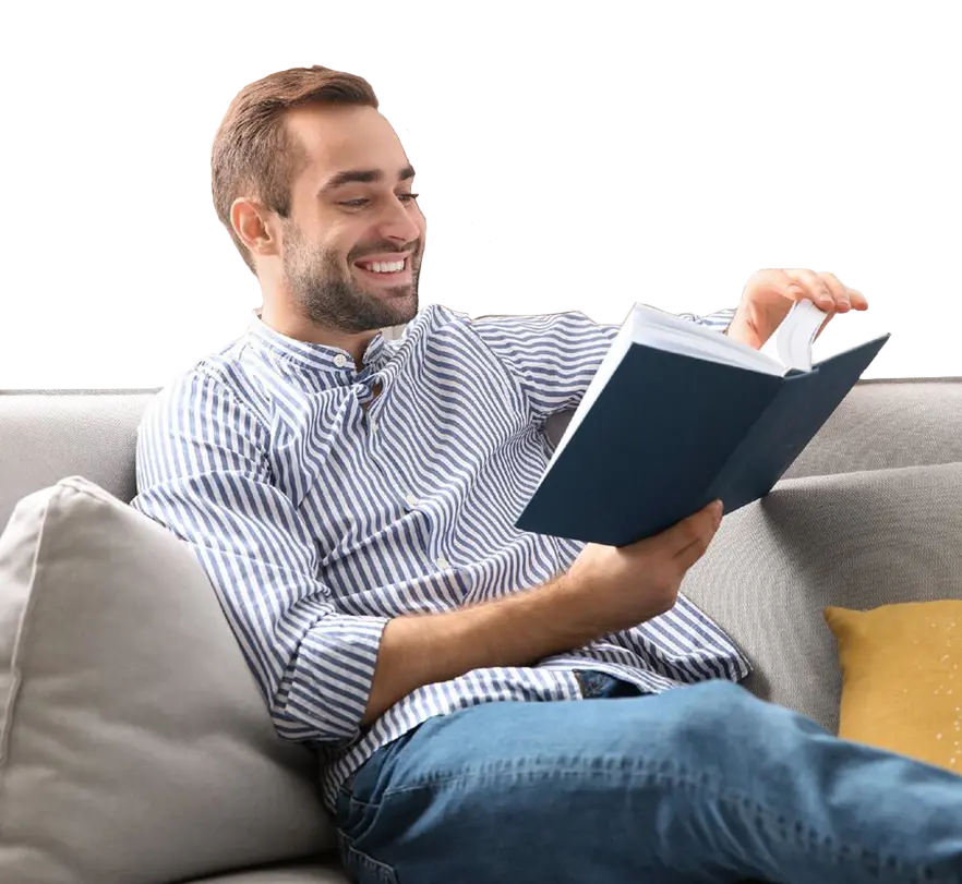 Man reading on armchair
